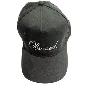 Obsessed Global Cursive Logo Trucker Hat in Black